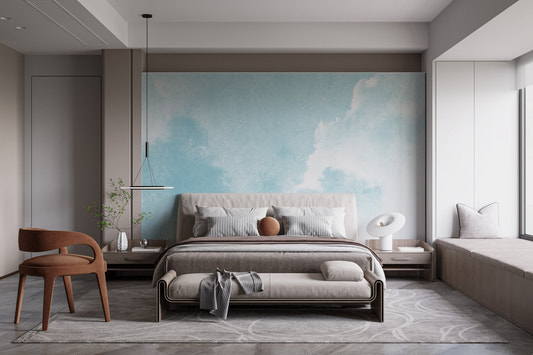 Minimalist bedroom featuring a light blue cloud wall mural behind a grey bed.
