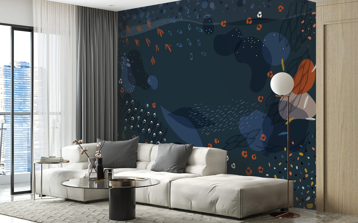 Modern living space with white furniture and a dark blue patterned wall mural.