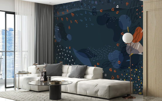 Modern living space with white furniture and a dark blue patterned wall mural.