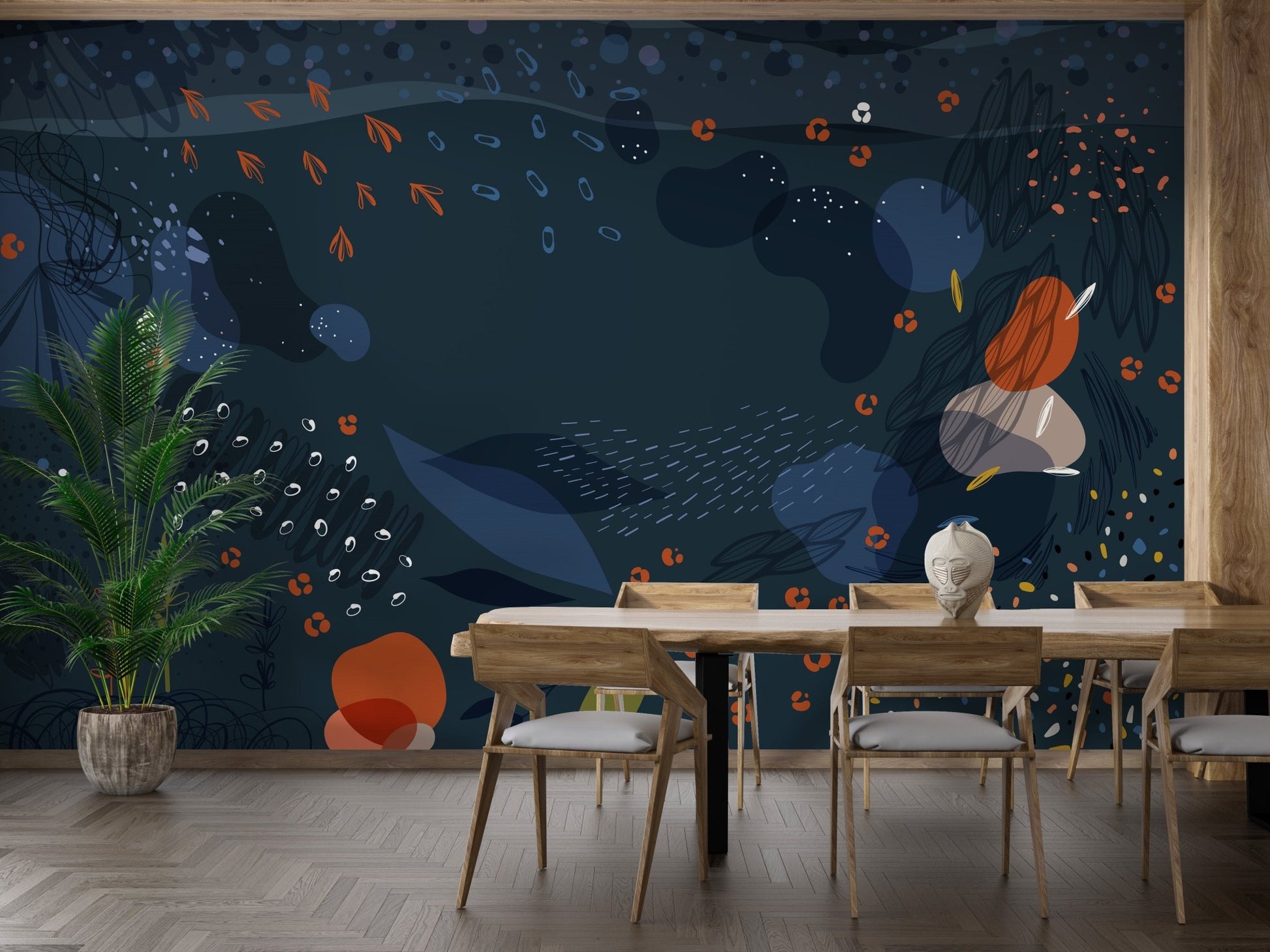 Abstract blue wall mural in a dining room with a long table and plants