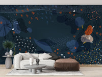 Blue modern abstract wall mural in a sitting area with a grey sectional couch.