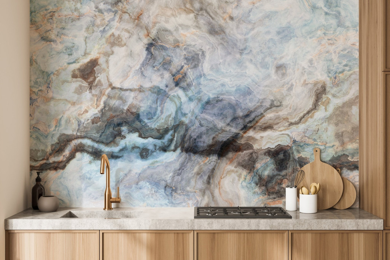 Blue Onyx Texture Marble Wall mural behind a kitchen stove with wooden cabinets.