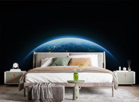 Earth from space wallpaper mural in dark modern style.