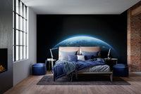 Space themed wallpaper mural with illuminated planet view.