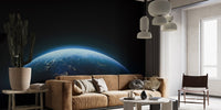 Modern space wall mural showing glowing blue planet.