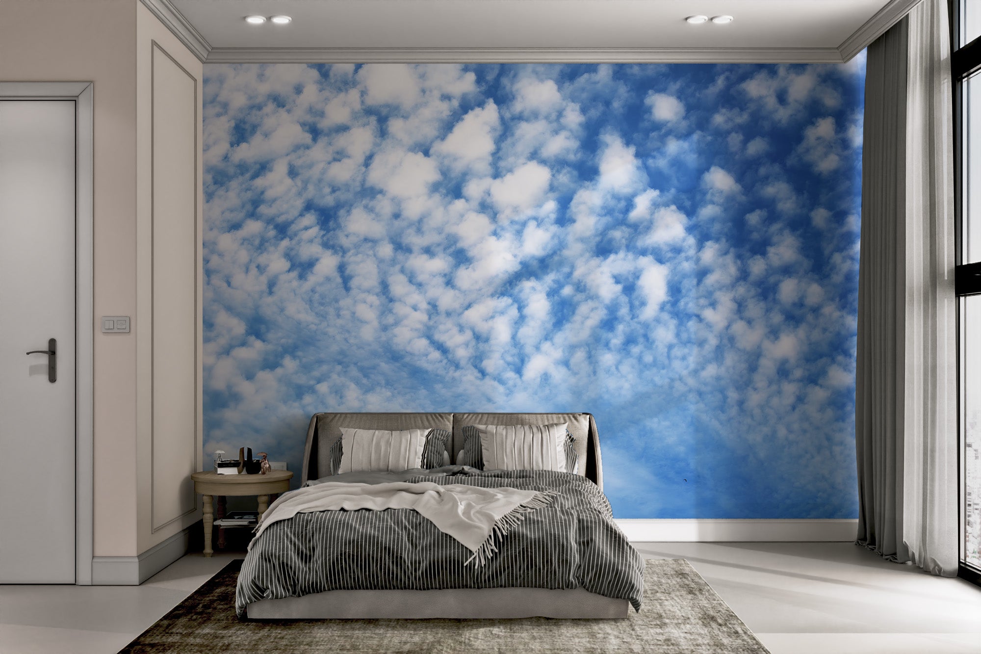 Bright blue sky with scattered white clouds wall mural.