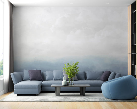 Blue sky wallpaper mural with soft clouds and calm blue gradient.