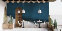 Blue brushstroke wall mural adding artistic charm to dining area interiors.

