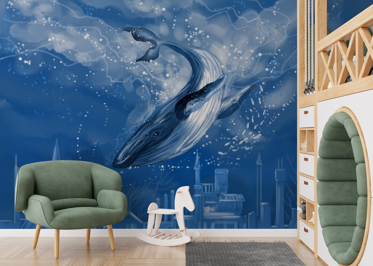 Cityscape and whale wall mural in a play area with a green chair.