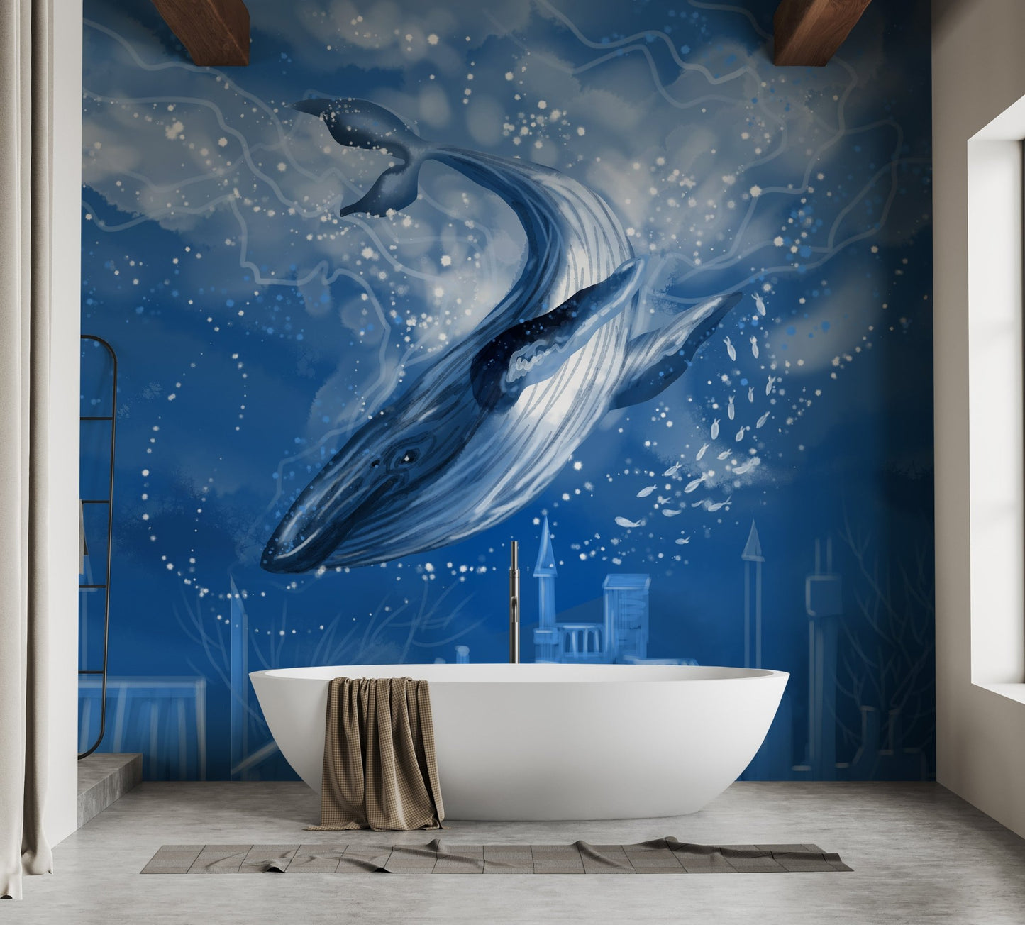 Blue whale wall mural behind a freestanding white bathtub.