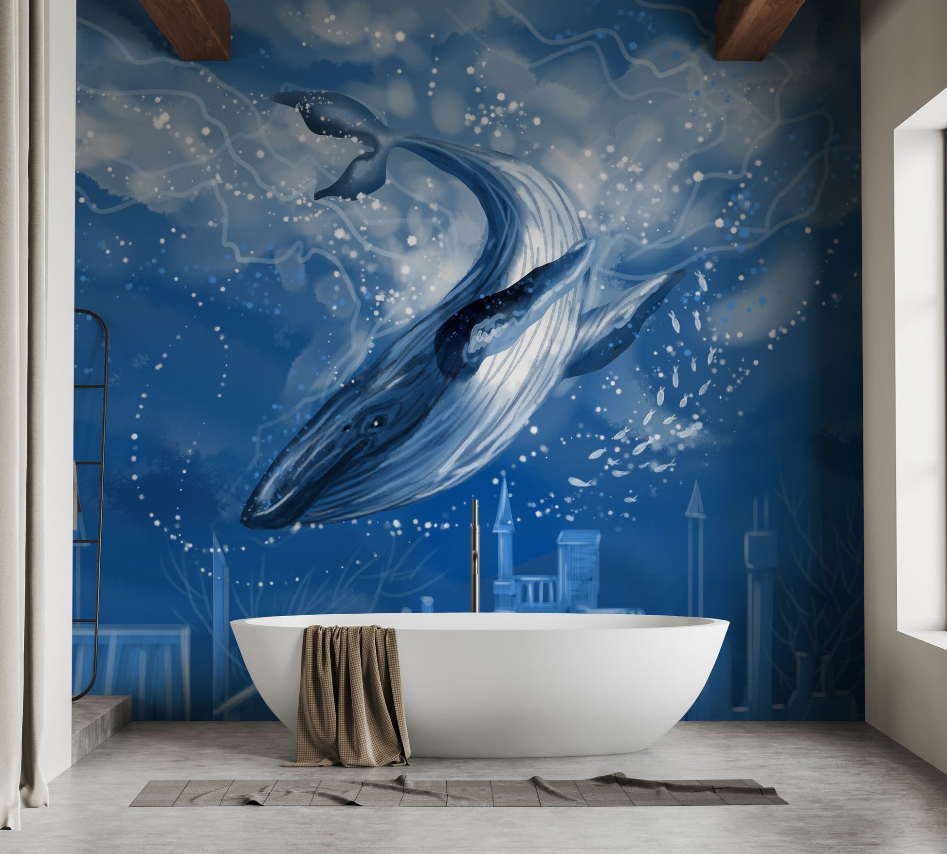 Blue whale wall mural behind a freestanding white bathtub.