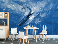 Whimsical whale wallpaper mural for a child's dining or craft table.