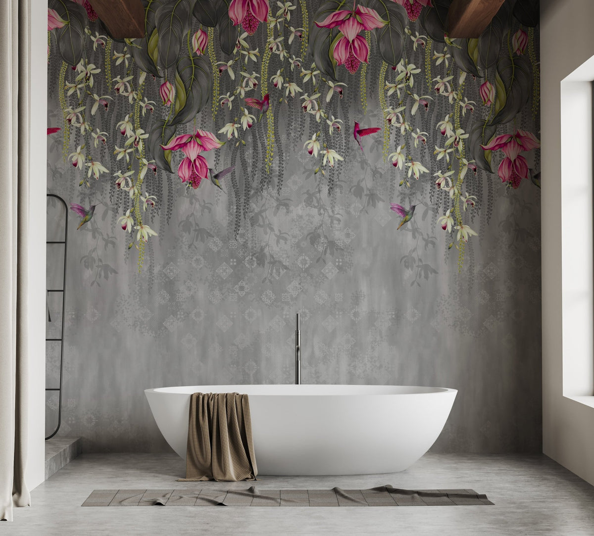 Pink hanging blossom wall mural behind white bathtub in luxury bathroom.