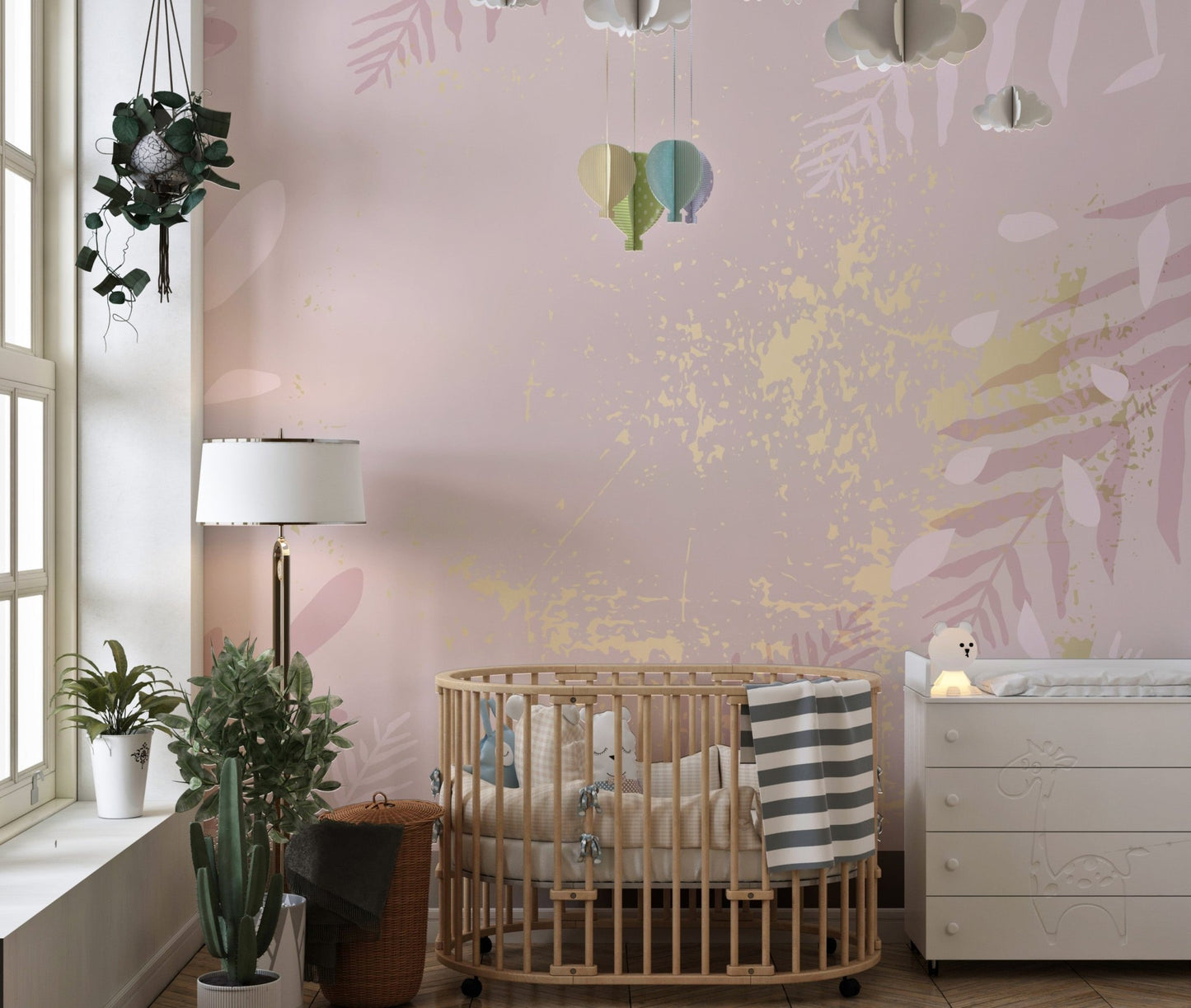 Gilded pastel wall mural with a blush elegance design in toddler room.
