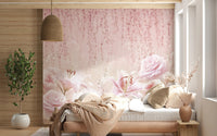 Bed with neutral bedding positioned in front of a rose garden wall mural