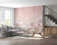 Living with a grey sofa and a large pink rose wall mural background.