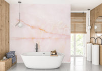 Blushing pink onyx marble mural for elegant and modern washroom interiors.
