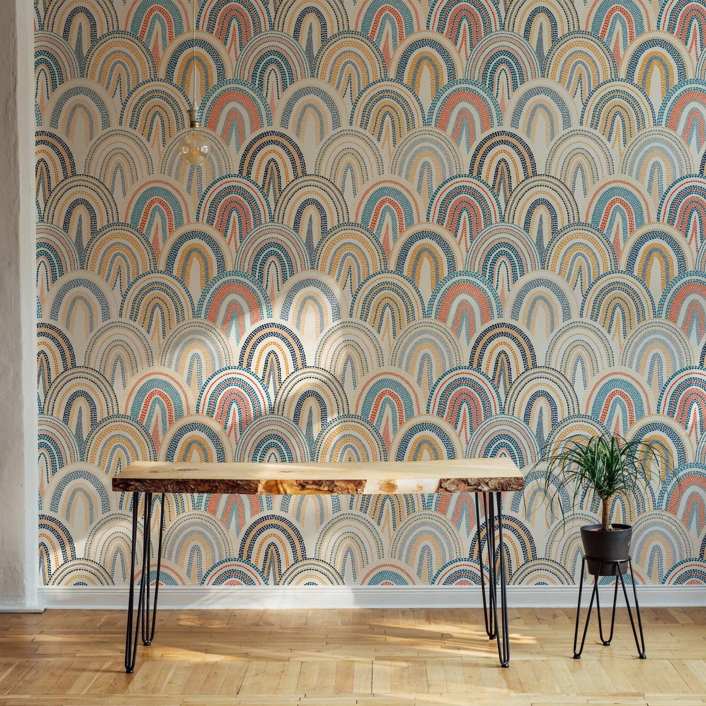 Living space patchwork wallpaper with terracotta and blue geometric shapes.