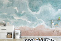 Artistic shoreline wall mural in muted aqua and warm sand shades.