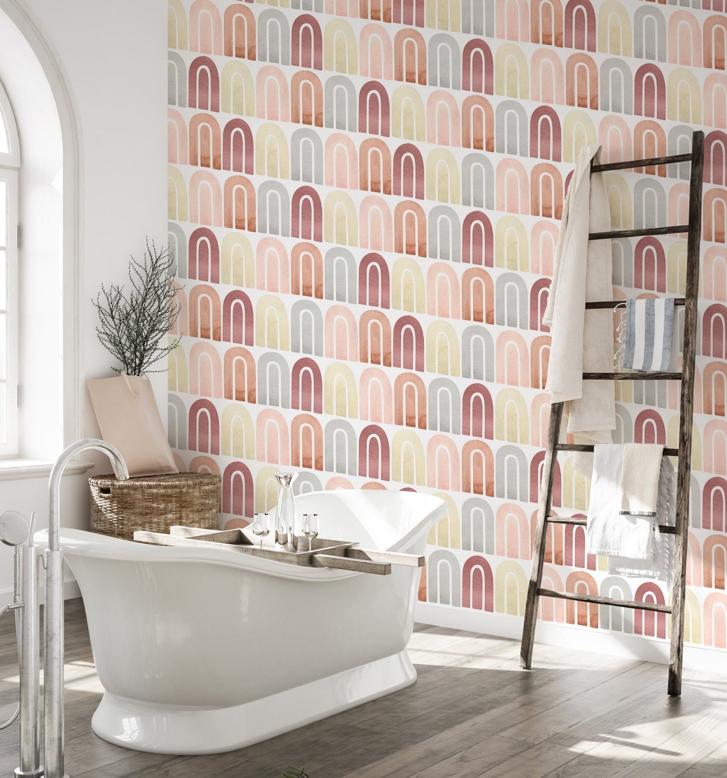 Watercolor arch pattern wallpaper in bathroom with white freestanding tub