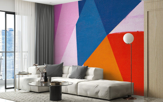 Bold geometric wall mural featuring pink, navy and orange color tones.