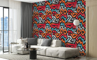 Colorful graffiti wallpaper with sharp vector zigzag pattern.