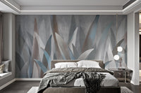 Vertical leaf pattern mural in dusty blue and grey shades for bright bedroom.