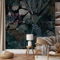 Contemporary botanical wall mural with layered leaves in sunlit living room.