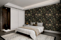 Vintage style wallpaper with dark green foliage and berries in large bedroom.