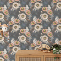 Flower wallpaper in a rustic kids room setting with wooden furniture.