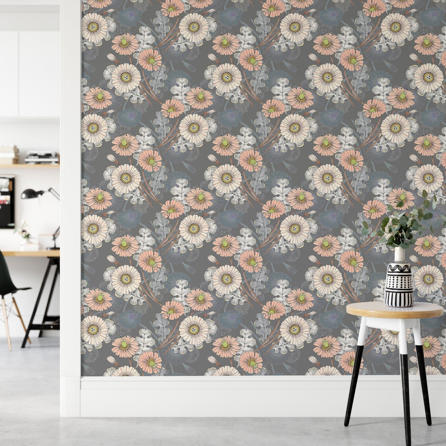 Decorative flowers drawing wallpaper in a hallway next to a small wooden stool.