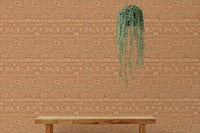 Rustic brown brick wallpaper in a workspace featuring a hanging green plant.
