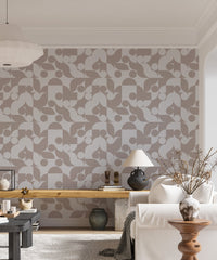 Minimalist geometric wall mural with brown abstract patterns in a home.