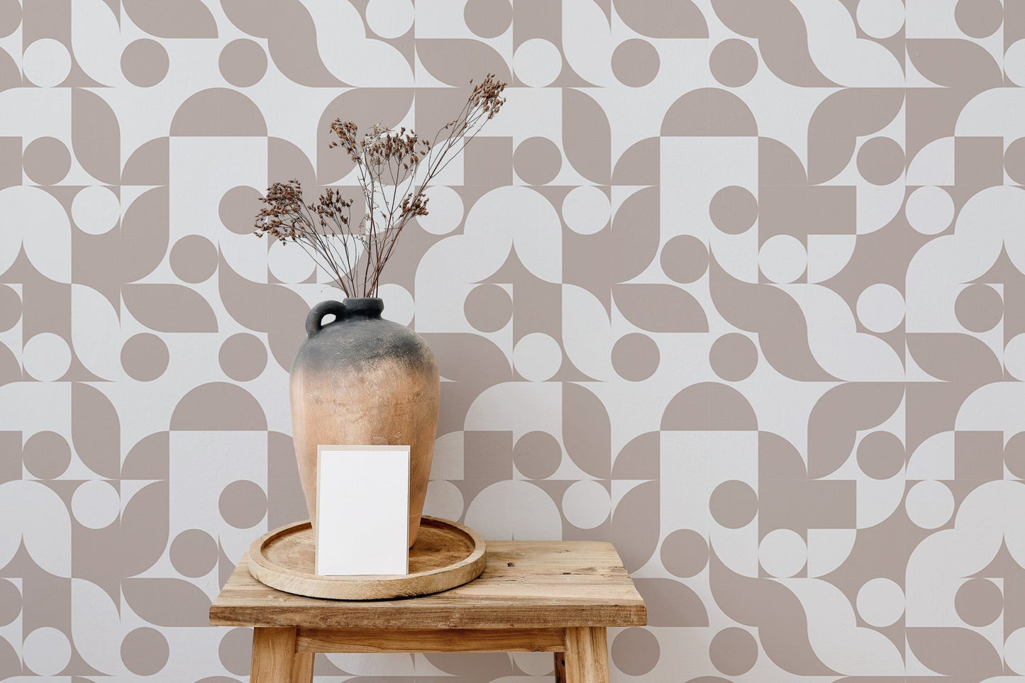 Brown abstract vector geometric wall mural behind a wooden shelf in a hallway.