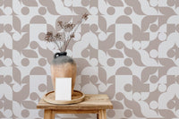 Brown abstract vector geometric wall mural behind a wooden shelf in a hallway.