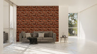 Spacious white room with a focal brown brick wallpaper and grey sofa.