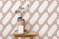 Brown color diagonal stripe wallpaper used as a backdrop for wooden decor.