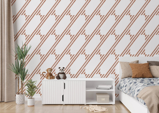 Brown diagonal stripe wallpaper in a child's bedroom with white storage cabinet.