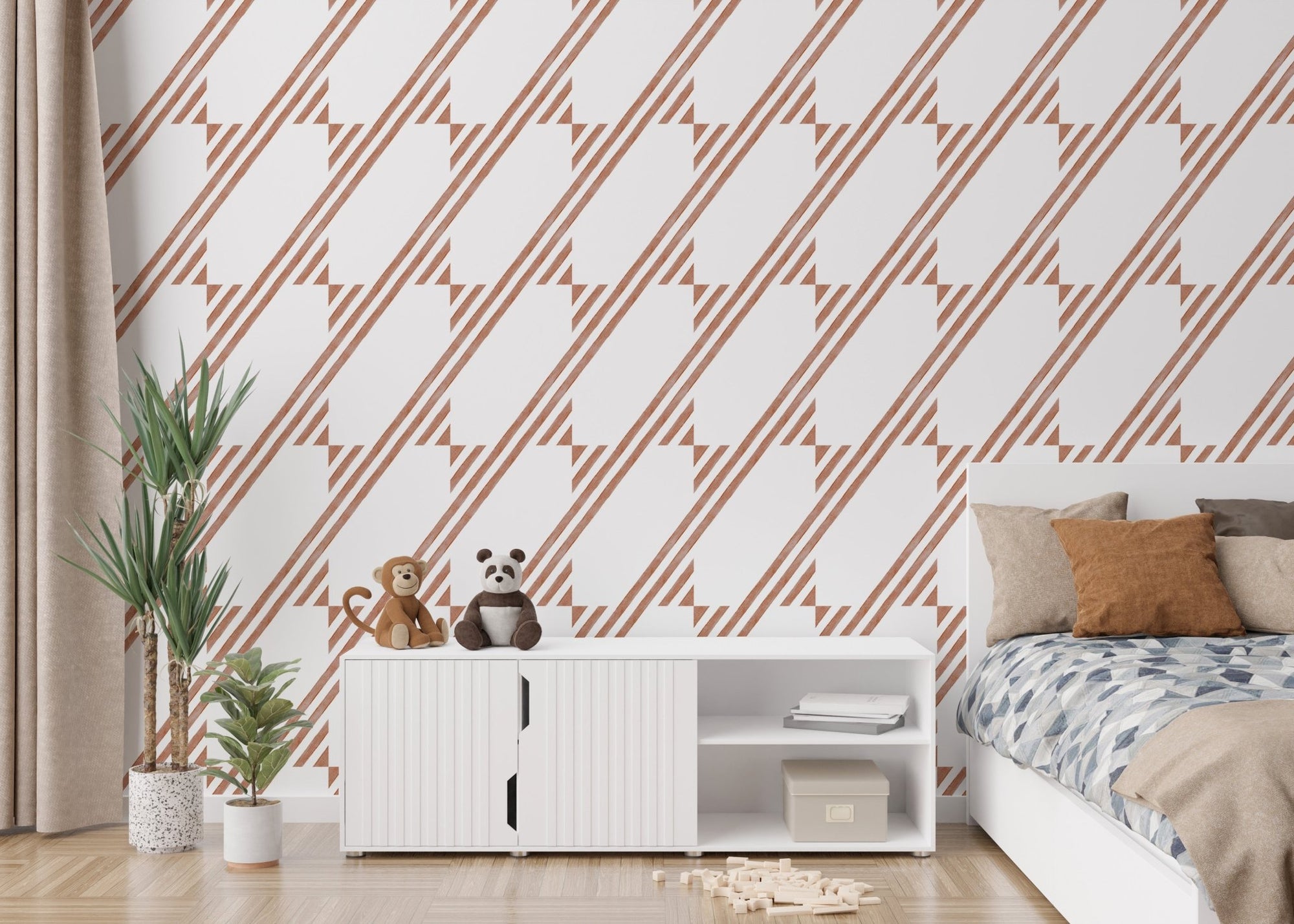 Brown diagonal stripe wallpaper in a child's bedroom with white storage cabinet.