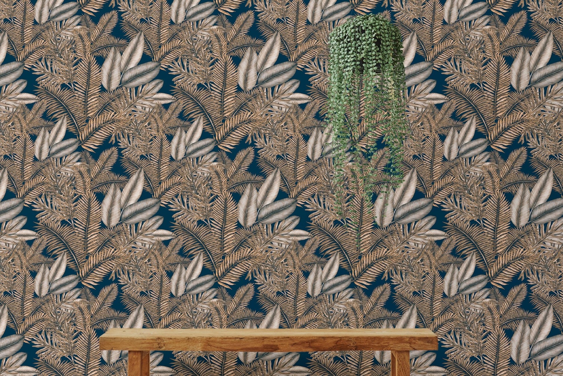 Dry leaves pattern wallpaper used as a backdrop for indoor hanging plants.