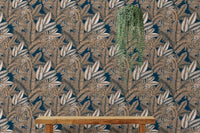 Dry leaves pattern wallpaper used as a backdrop for indoor hanging plants.