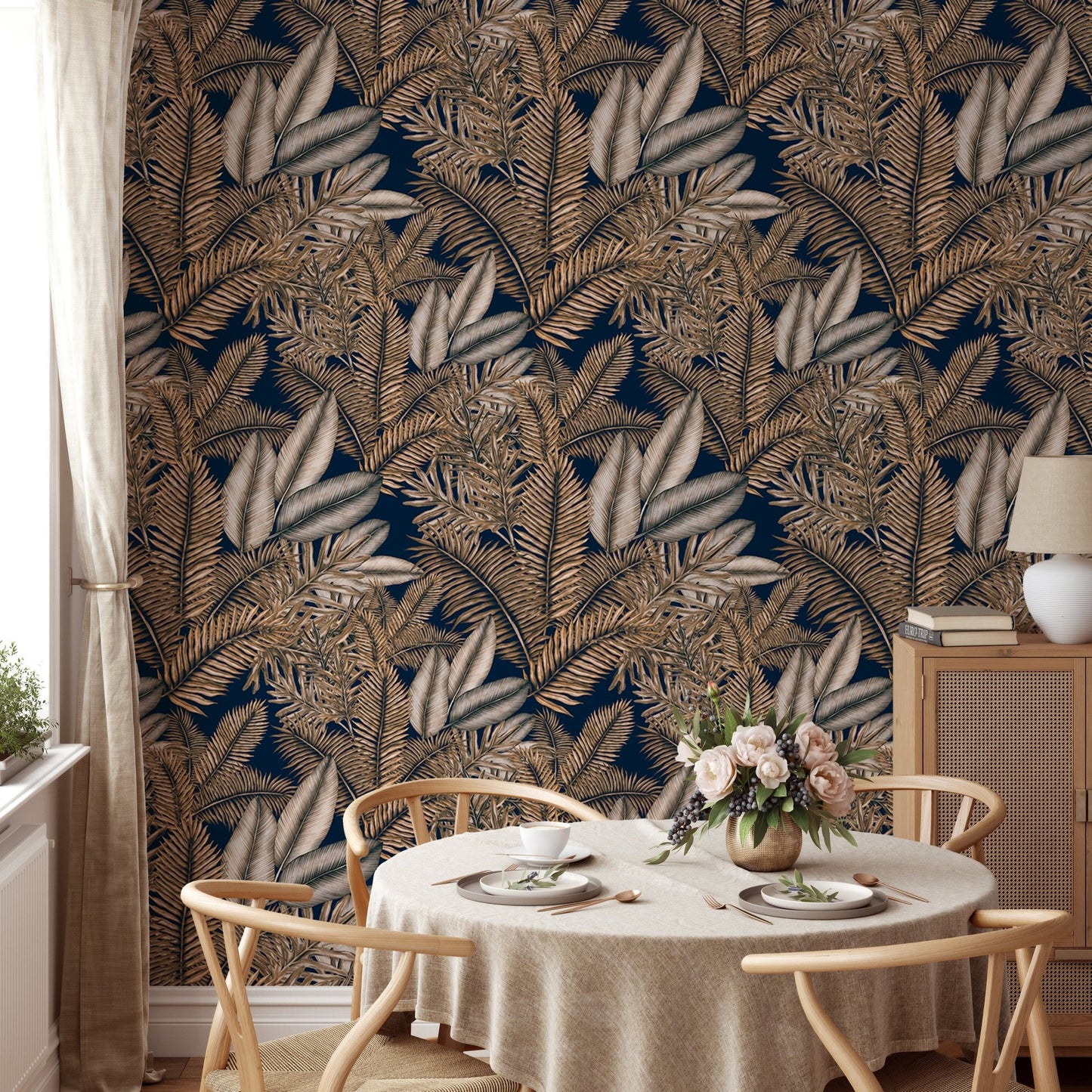 Brown color dry leaves wallpaper in a sunlit dining space with wooden chairs.