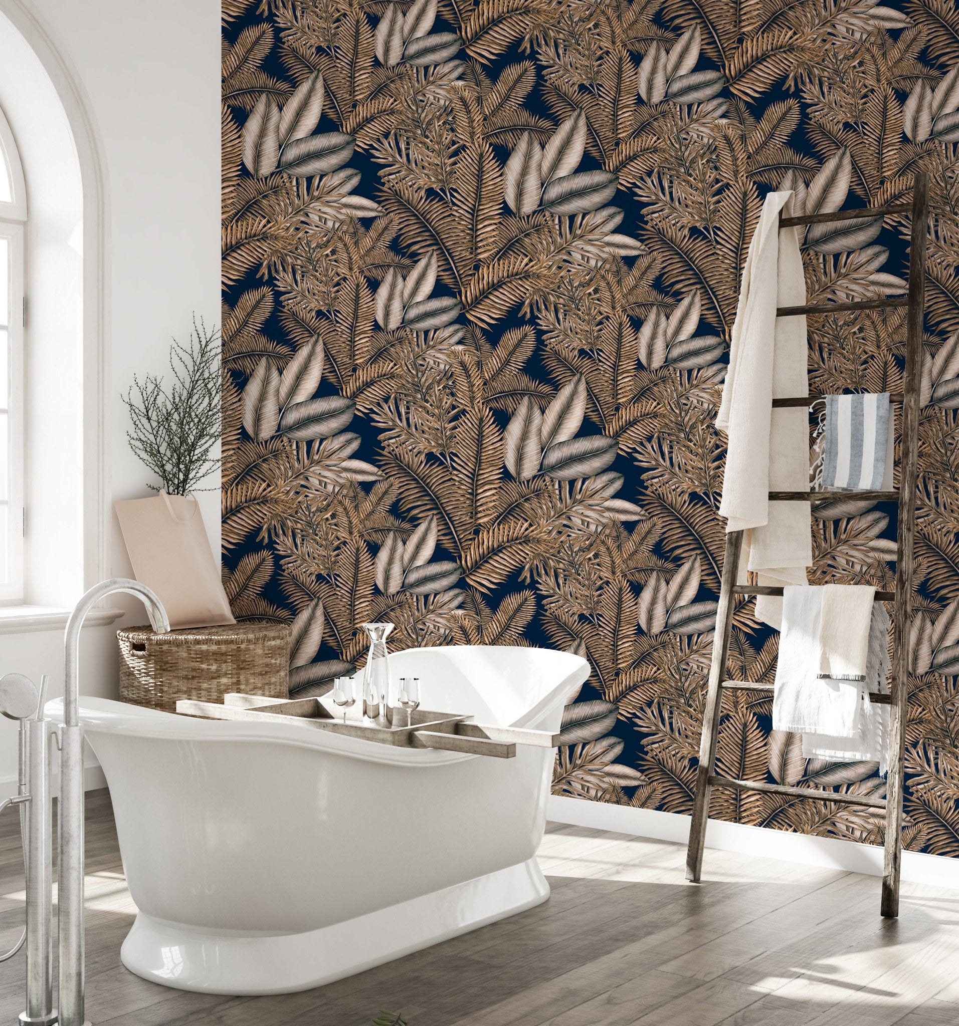 Brown color tropical dry leaves wallpaper in a bathroom with a white bathtub.