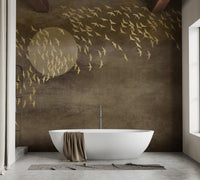 Luxury bathroom with a freestanding tub against golden bird wall mural.