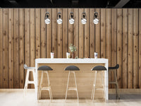 Wooden effect wall mural in a modern bar area with high stools.