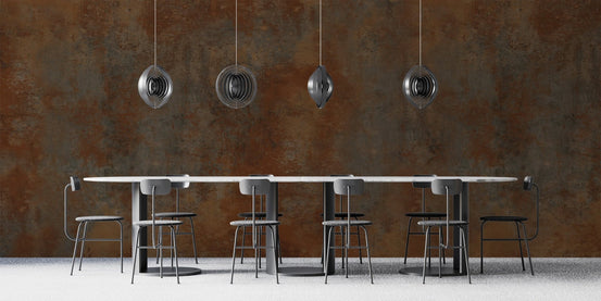 Gritty textured metal wallpaper with a deep sienna and charcoal color palette.