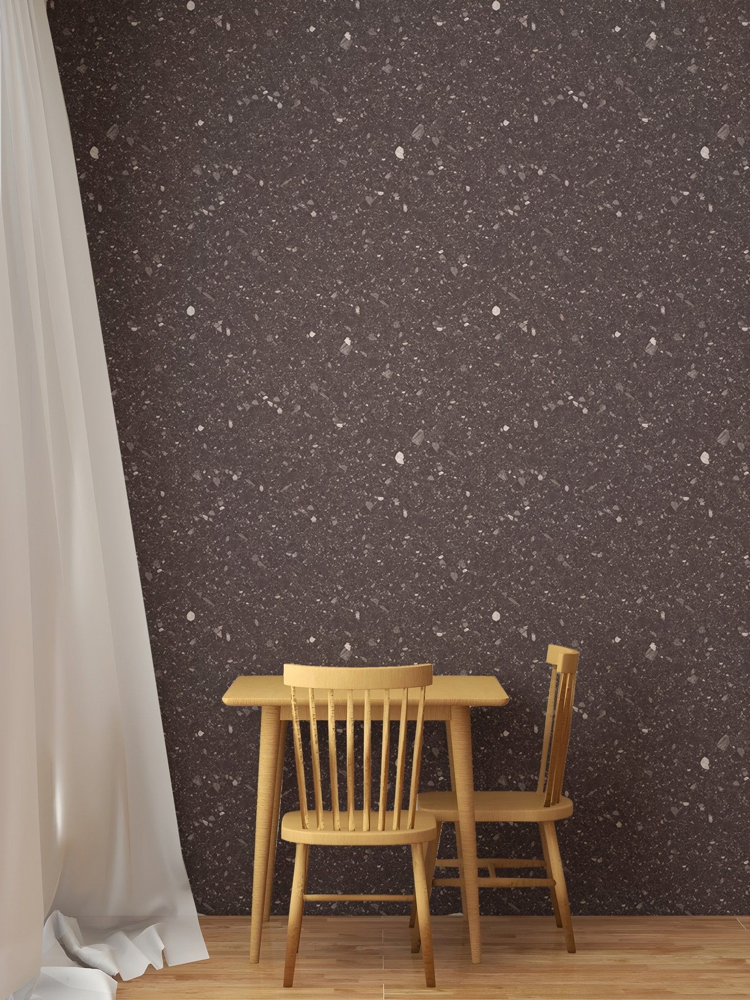 Dark terrazzo wallpaper in a small dining area with a wooden table and chair.