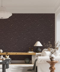 Brown Venetian Quartz Stone Terrazzo Wallpaper in a living room with a white sofa.