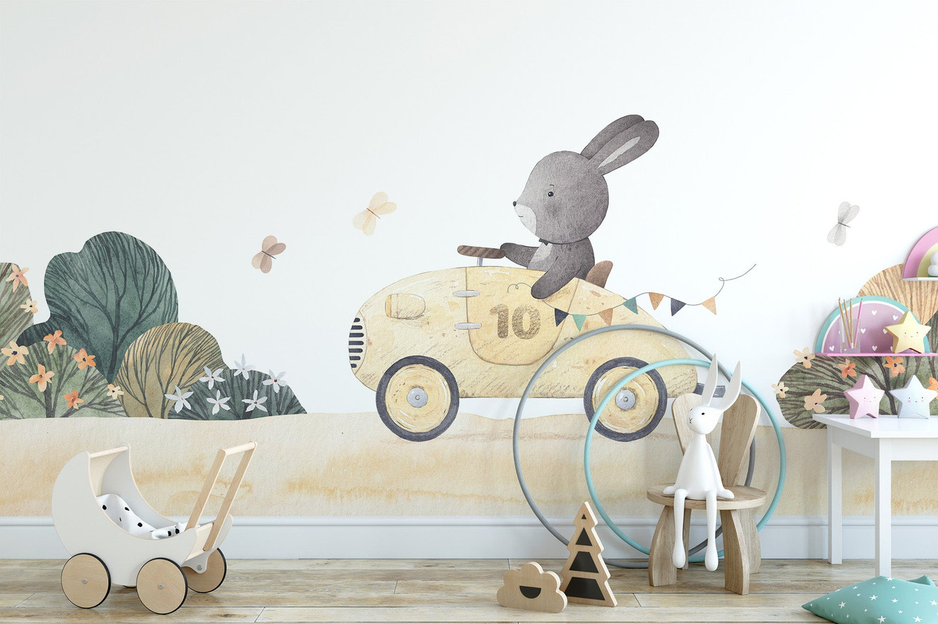 Bunny joyful ride wall mural with rabbit in yellow car wallpaper.