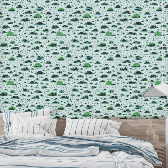Decorative bushes and footprints wallpaper with a soft pastel base.